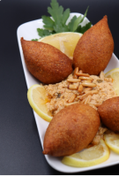 Kebbeh Fish with Tagen (four pieces)